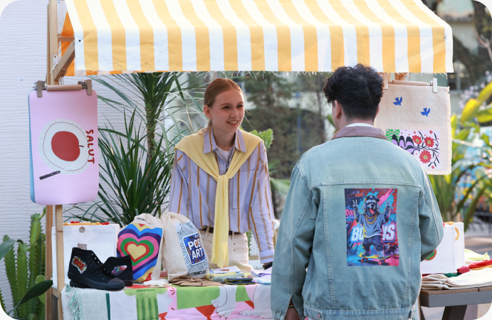 Market booth with printed goods